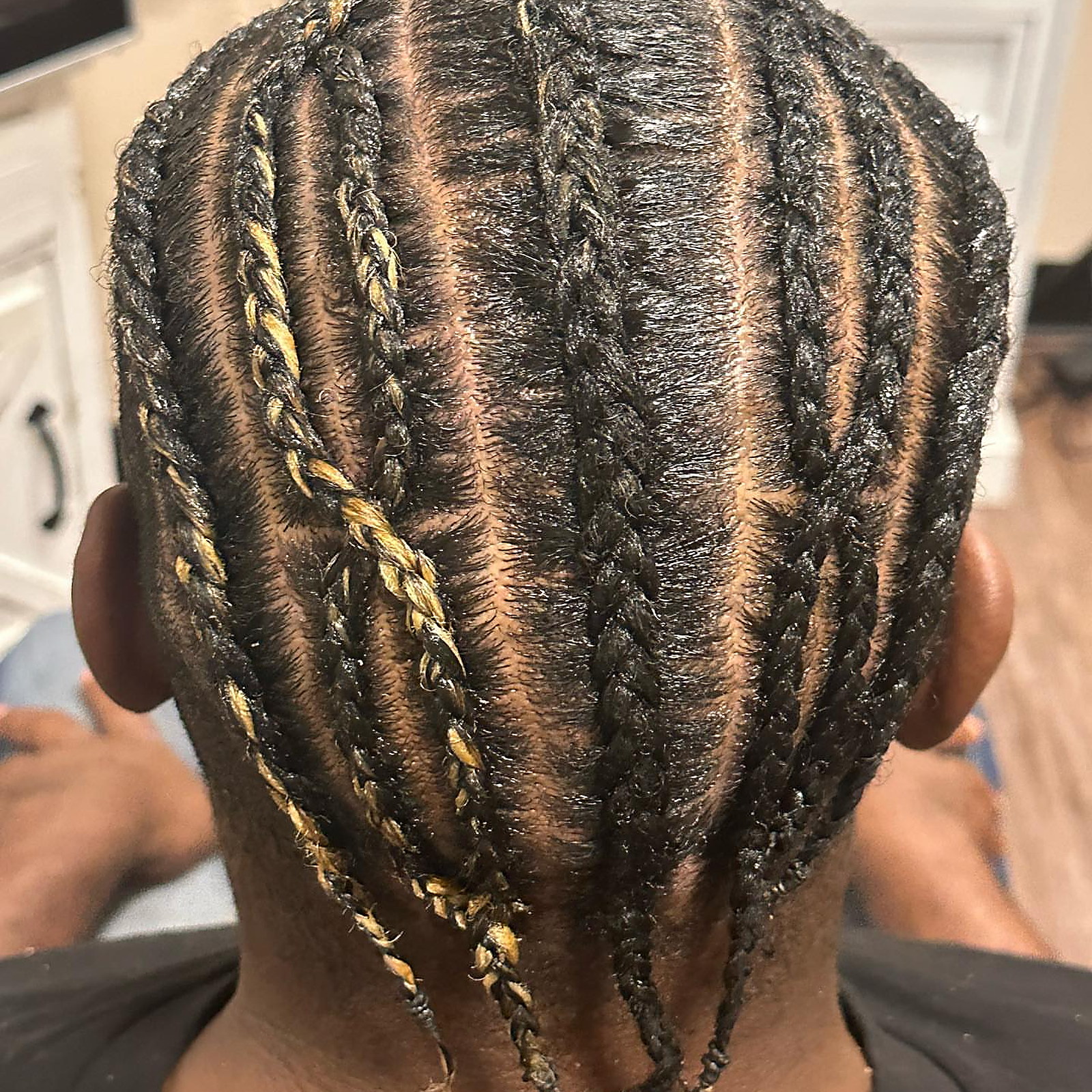 Men's cornrows with color — Straight-backs carrying blonde feed-in strands